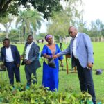 From R-L, The Prime Minister, Deputy Prime Minister and Minister for Youth inspecting the Coffee seedlings for distribution to farmers.