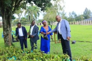 From R-L, The Prime Minister, Deputy Prime Minister and Minister for Youth inspecting the Coffee seedlings for distribution to farmers.